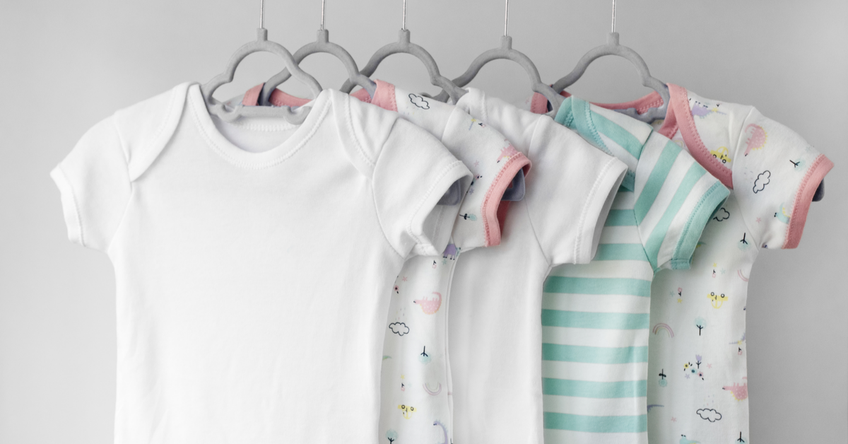 What should be considered when buying baby clothes?